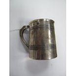 A Hallmarked Silver Christening Mug, with reeded bands.