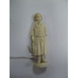 A XIX Century Carved Ivory Seal as a Figure of Fisher Girl, 7cms high.