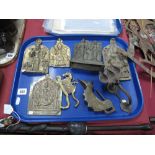 Three Brass and Two Bronzed Middle Eastern Figural Wall Plaques, equestrian brass cutting implement,