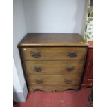 A Late XIX Century Beech Chest , of three drawers, having pierced iron handles and shaped apron.