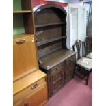 A XX Century Small Oak Dresser, rack with a domed top, two shelves, base with two small drawers,