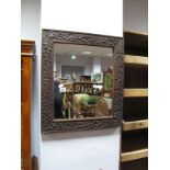 A Rectangular Wall Mirror, in oak pokerwork thistle carved frame, folding and arched mirrors. (3)