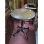 A XIX Century Mahogany Pedestal Table, with a circular top, turned pedestal, on cabriole legs.