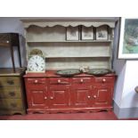 A Painted Pine Kitchen Dresser, the top with two shelves, the base with four short drawers and