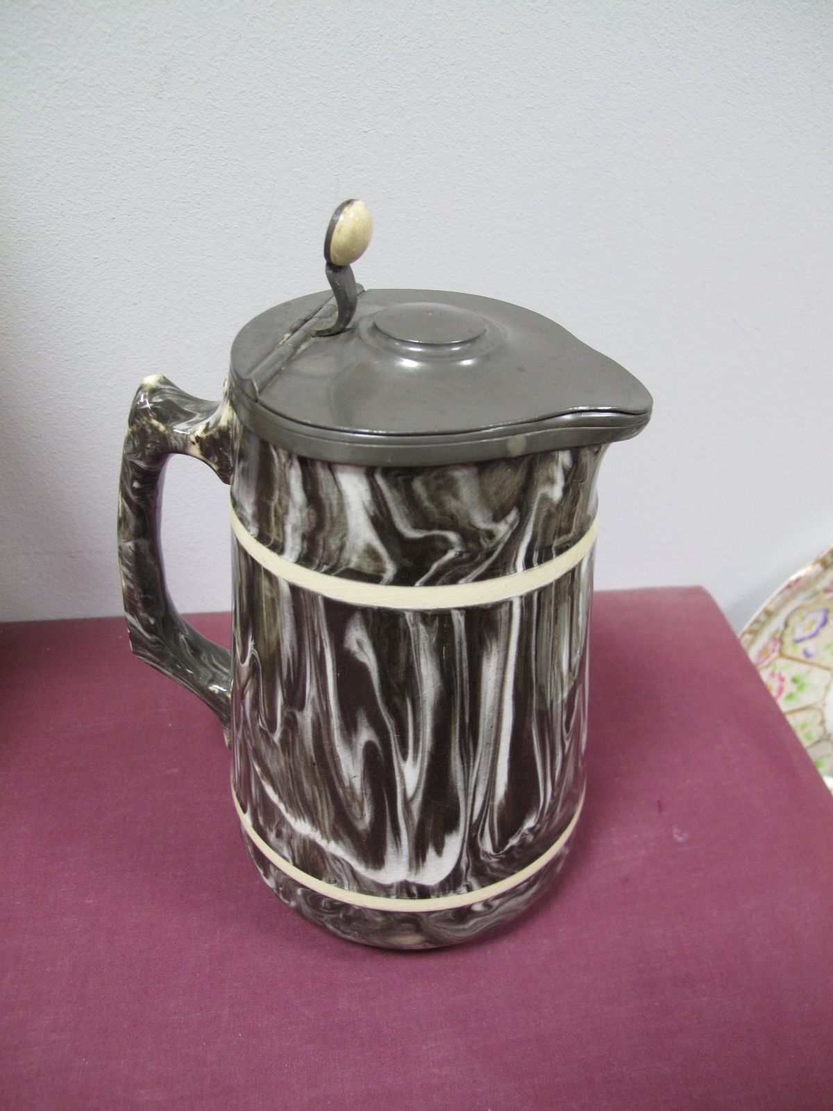 A Late XIX Century MacIntyre Agate Ware Hot Water Jug, with thumb piece to pewter lid, impressed