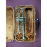 A Cased Lafleur, Boosey and Hawkes Trumpet.