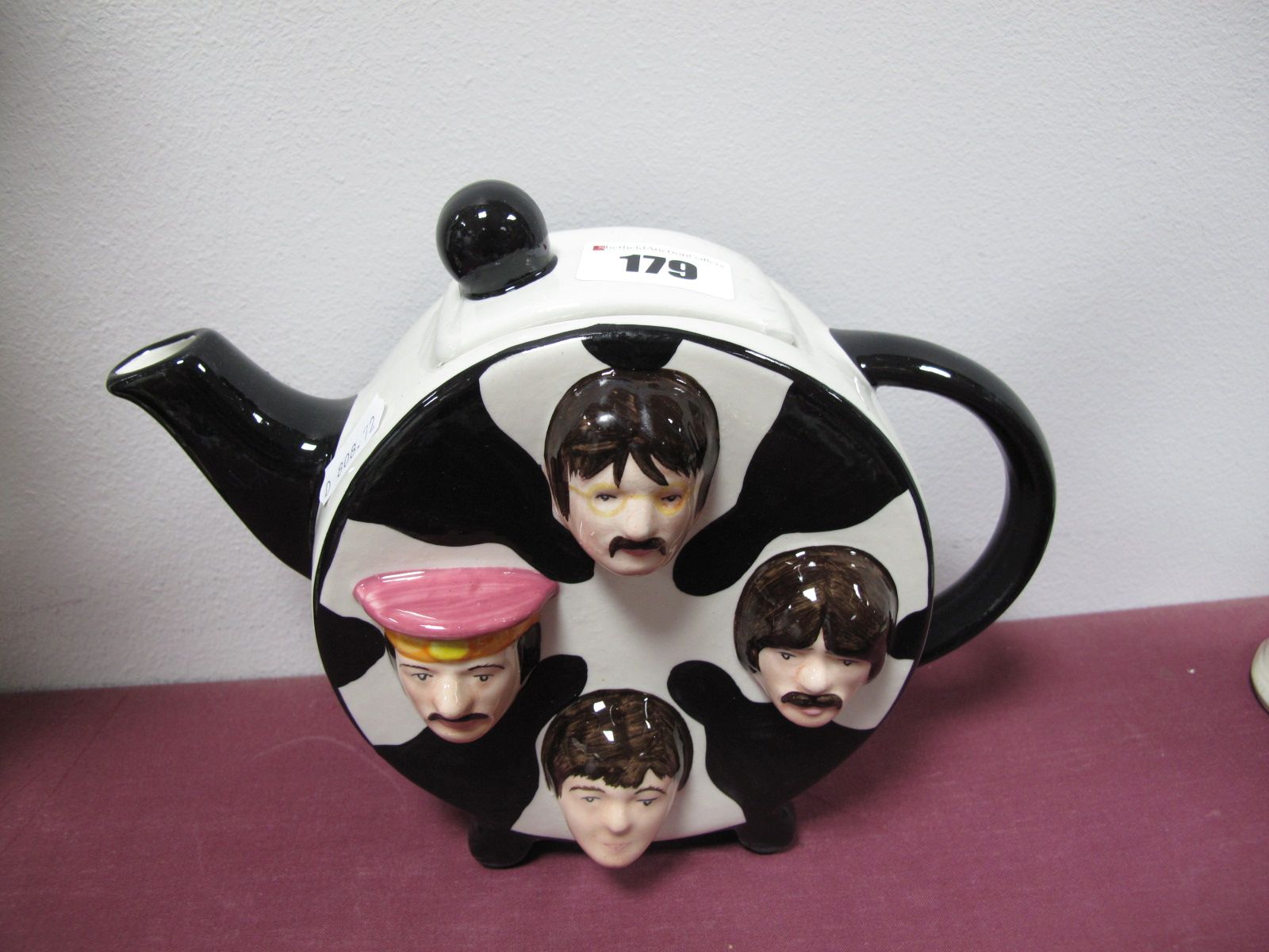 A Lorna Bailey Four Face Teapot.