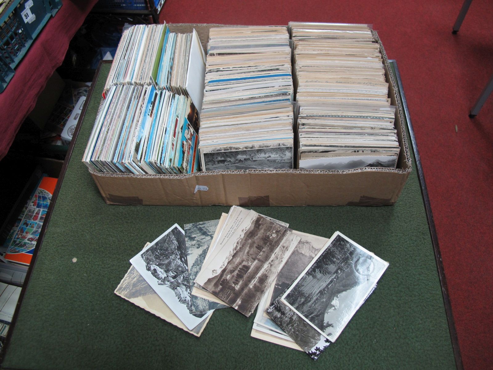 An Array of Postcards, regularly from the mid XX Century which sometimes depict mountains.