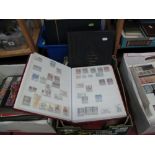 Commonwealth Stamps, a tin full of mid XX Century used issues sorted into packets, together with a