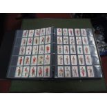 Approximately Twenty Four Sets of Cigarette Cards by the Major Manufacturers, in a modern album.