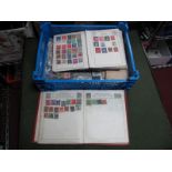 All World Stamps, an early to mid XX Century accumulation in two albums and off paper in packets and