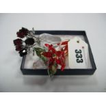 Swarovski Miniature Vase of Roses, together with a Swarovski insect brooch and a miniature