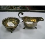 A Silver Hallmarked Sauce Boat, Birmingham 1913, leaf capped double "C" scroll handle on three