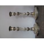 A Pair of Plated Candlesticks, with gadrooned decoration, crested and engraved motto "VIRTUTE NON