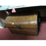 A XIX Century Brown Painted Tin Trunk, with a domed top and with carrying handles.