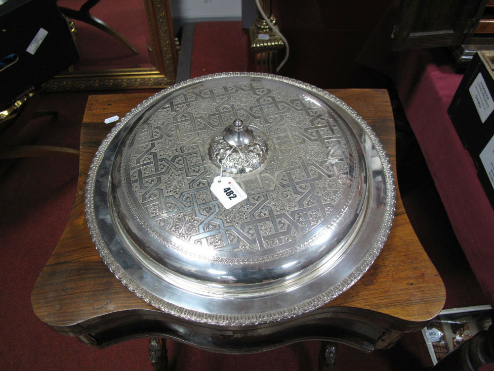 WITHDRAWN A Large Middle Eastern Serving Tray and Cover, of circular form, the pull off cover allove