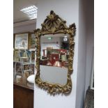 An XVIII Century Style Gesso Pier Glass, with C scroll and foliage decoration.