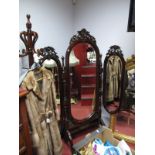 A XX Century Mahogany Framed Triple Cheval Mirror, each bevelled plate surmounted by flower and