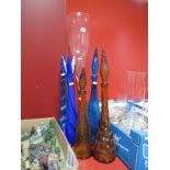 Large Champagne Flute, amber and blue glass bottles and a blue glass tapering vase. (6)