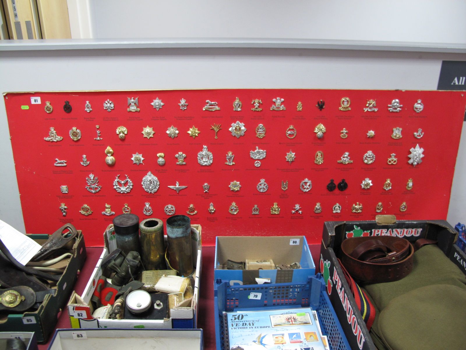 A Set of Seventy Eight Mid 1960's Staybrite British Army Cap Badges, mounted on a display board.