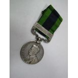 A Single India General Service Medal King George V Mohmand 1933, awarded to  BARBER Ghulam Mohd, 2