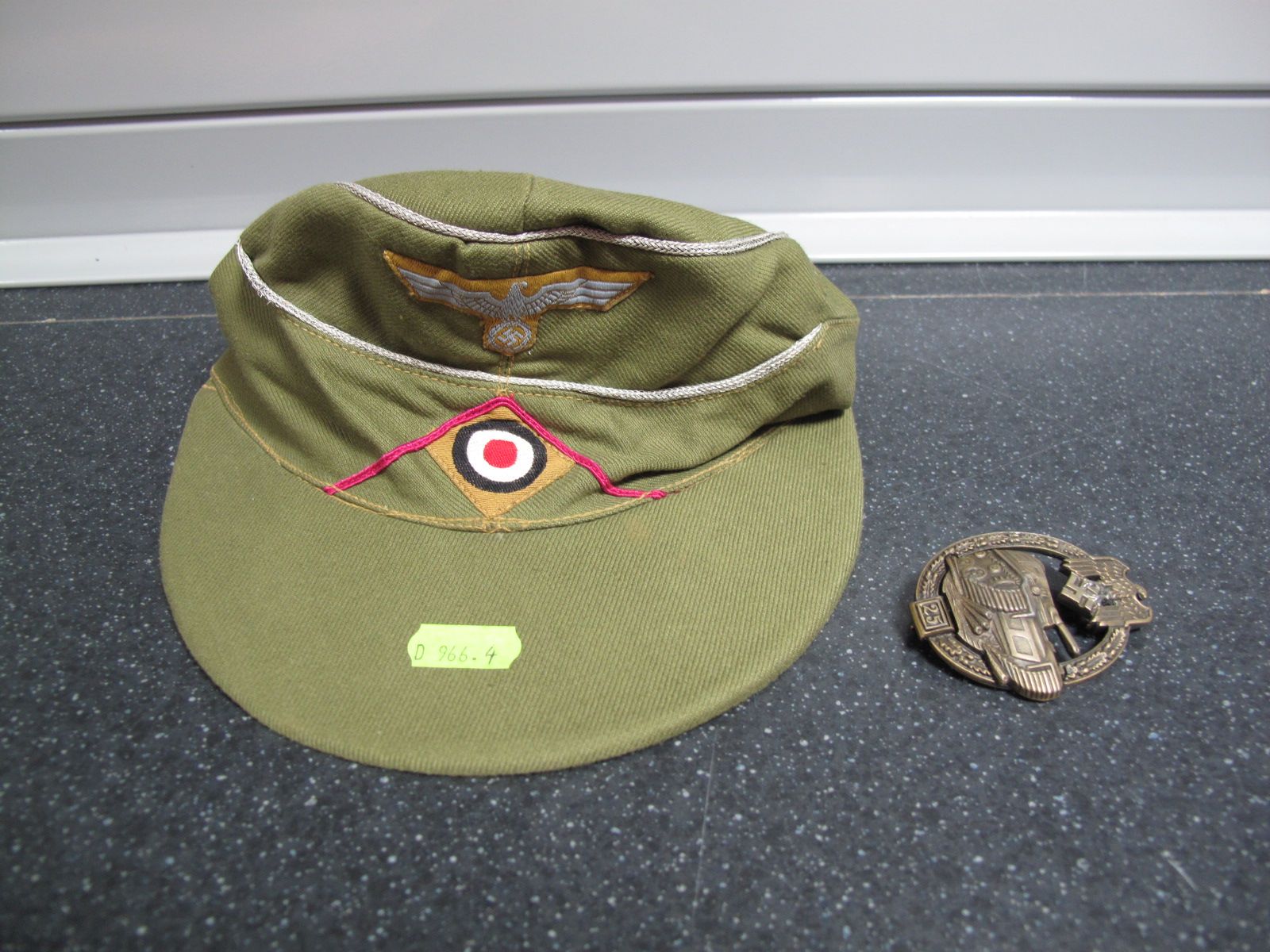 Replica Nazi Third Reich Officers Tropical Field Cap, plus replica Nazi tank badge (25).