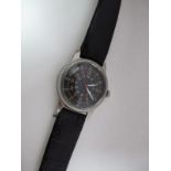 A Second Half XX Century US Military Wristwatch by Waltham, the black dial with Arabic numerals, the