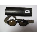 A Mid XX Century Pair of German Tinted Flying Goggles, in original tin. Tin stamped F1- Splitter