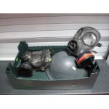 Two R.A.F. Issue Gas Masks, one marked "Avon 2 1986", the other "Avon 1969 SR.6/2 GD"; Together with