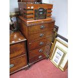 A Mahogany Chest of Drawers, with five small drawers, on cabriole legs.