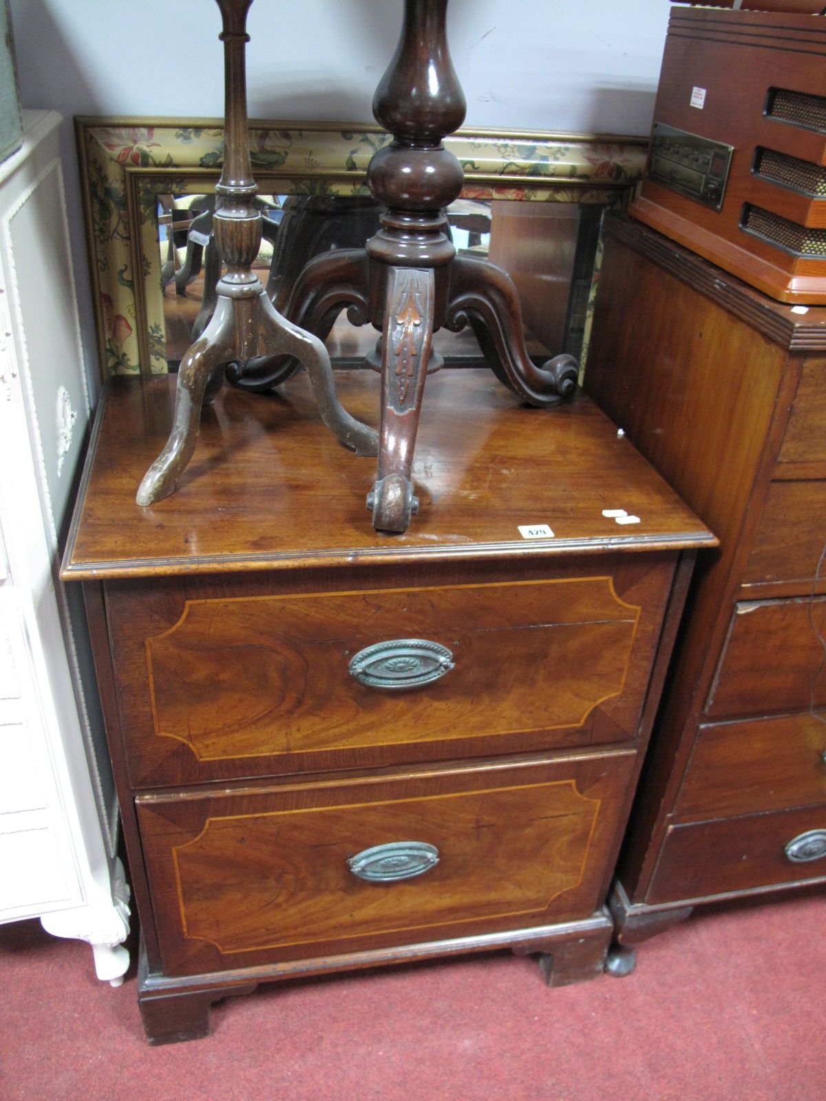 A Late XVIII Century Mahogany Two drawer Bedroom Cupboard, rectangular top, moulded edge, over two