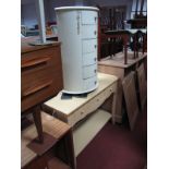 A Shabby-Chic Occasional Table, rectangular top, demi lune six drawer mini chest and a painted