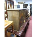 A Mid XX Century Mahogany Cabinet, having twin cupboard doors, with painted panels depicting a XIX