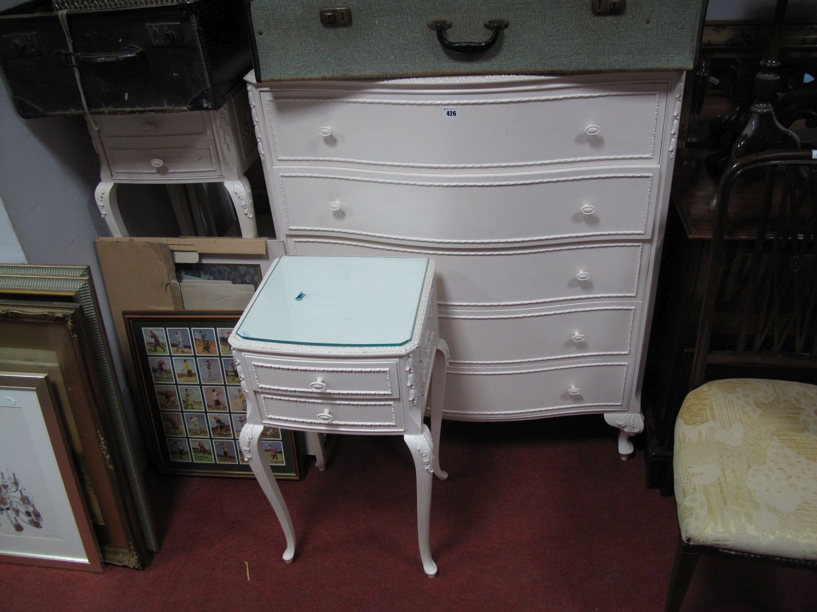 A XX Century White Painted Serpentine Chest of Drawers, pair of bedside chests, and a Cheval mirror.