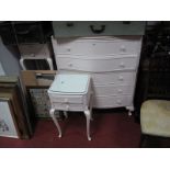 A XX Century White Painted Serpentine Chest of Drawers, pair of bedside chests, and a Cheval mirror.