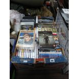 Approximately Sixty DVD's, including Men in Black, Dads Army, Queen, Airplane!, etc:- One Box