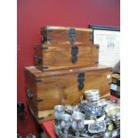 A Pair of Three Hardwood Graduated Boxes, with iron locks, twin handles, stud decoration.