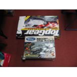 A Scalextric "Top Gear" Powerlaps Set, and an earlier Scalextric XR3i racing set. Both playworn,