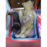 Three Mid XX Century Soft Toys, including a jointed straw filled teddy bear with growl. All well