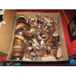 A Large Mixed Lot of Assorted Wooden and Other Costume Jewellery:- One Box