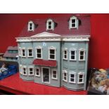 A Modern Colonial Style Dolls House.