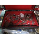 Medallion Pendants, chains, bracelet, 1887 coin brooch, etc, contained in a black painted box.