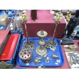 A Pair of Arts & Crafts Style Brass Candlesticks, brass table lamp, brass figures et :- One Tray
