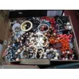 A Mixed Lot of Assorted Costume Jewellery, including beads, bangles, etc:- One Tray