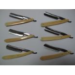 Six Late Victorian Cutthroat Razors, ivory scales, foliate chased spines, shaped and jimped tangs