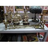 A Pair of Cast Brass Andirons, ring and knopped columns with wrythen ball finial, all on lion paw