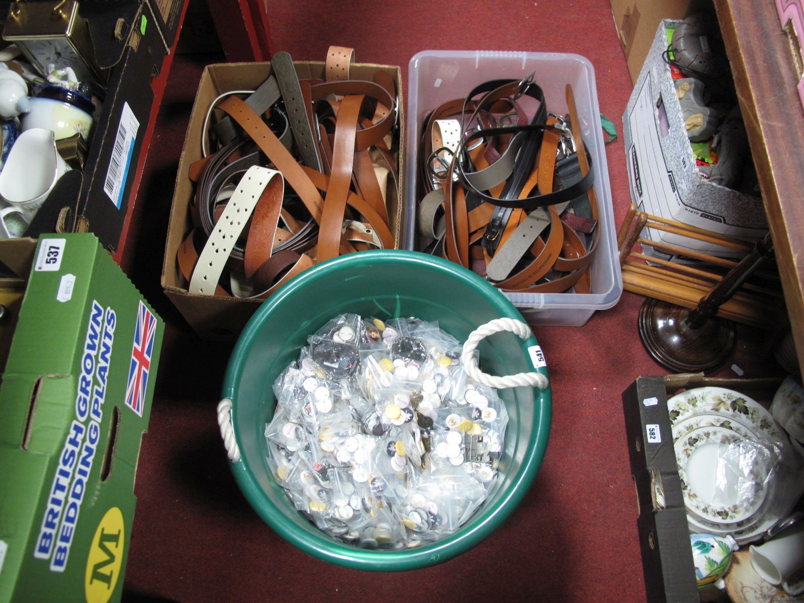 A Quantity of Leather Belts, together with two boxes and a tub of badges.