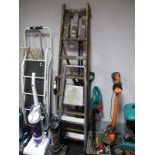 A Pair of Wooden Step Ladders, aluminium household steps, and a collection of garden tools.