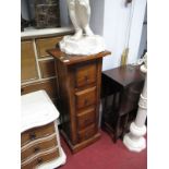 A Hardwood Chest of Drawers, with four small drawers, on bracket feet.