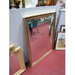 A Large Rectangular Bevelled Wall Mirror, in gilt frame.